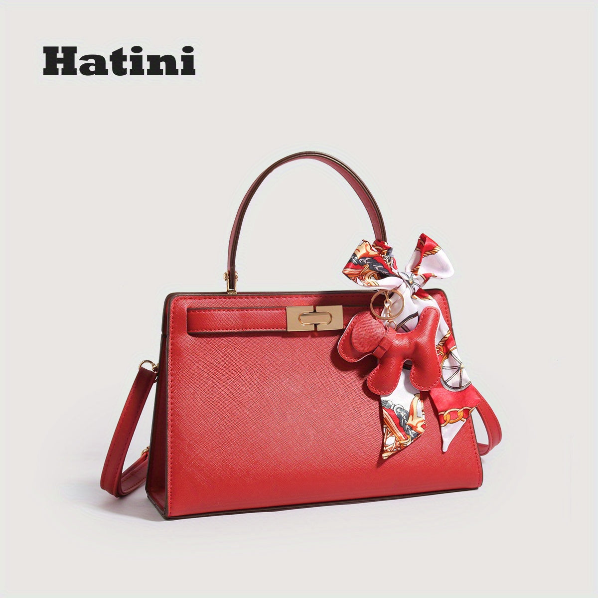 Élégant sac fourre-tout en similicuir synthétique rouge avec charme de nœud coloré