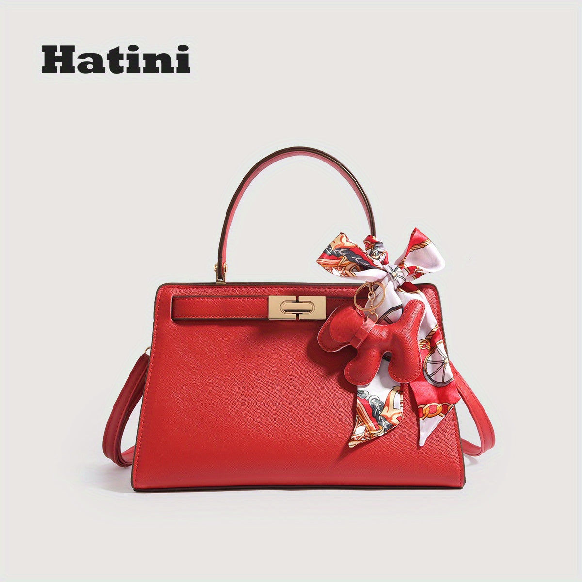 Élégant sac fourre-tout en similicuir synthétique rouge avec charme de nœud coloré