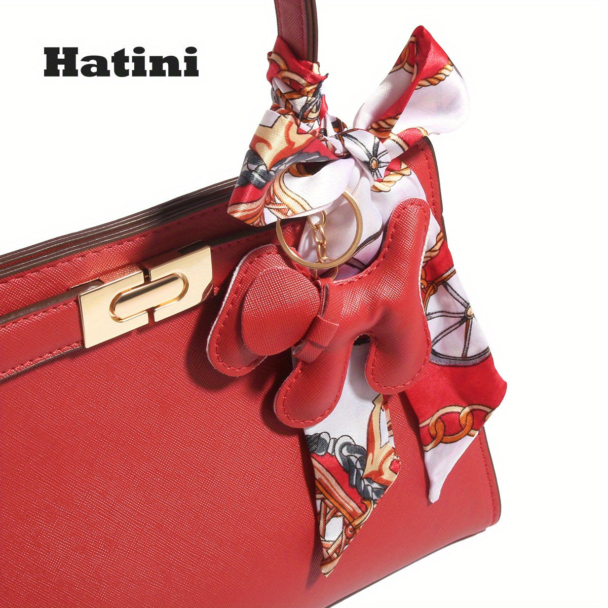Élégant sac fourre-tout en similicuir synthétique rouge avec charme de nœud coloré
