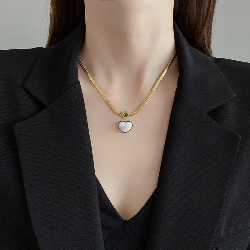 Ensemble de collier et de boucles d'oreilles en acier inoxydable