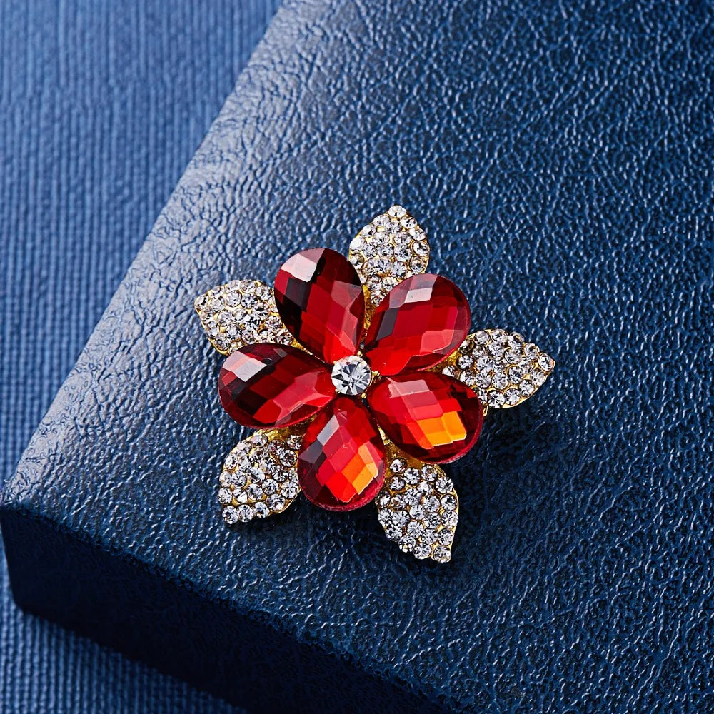 Broche à fleurs en cristal pour femmes, bleu profond, plante, Badge élégant, bijoux à la mode, broche pour fête de mariage, cadeaux de fête