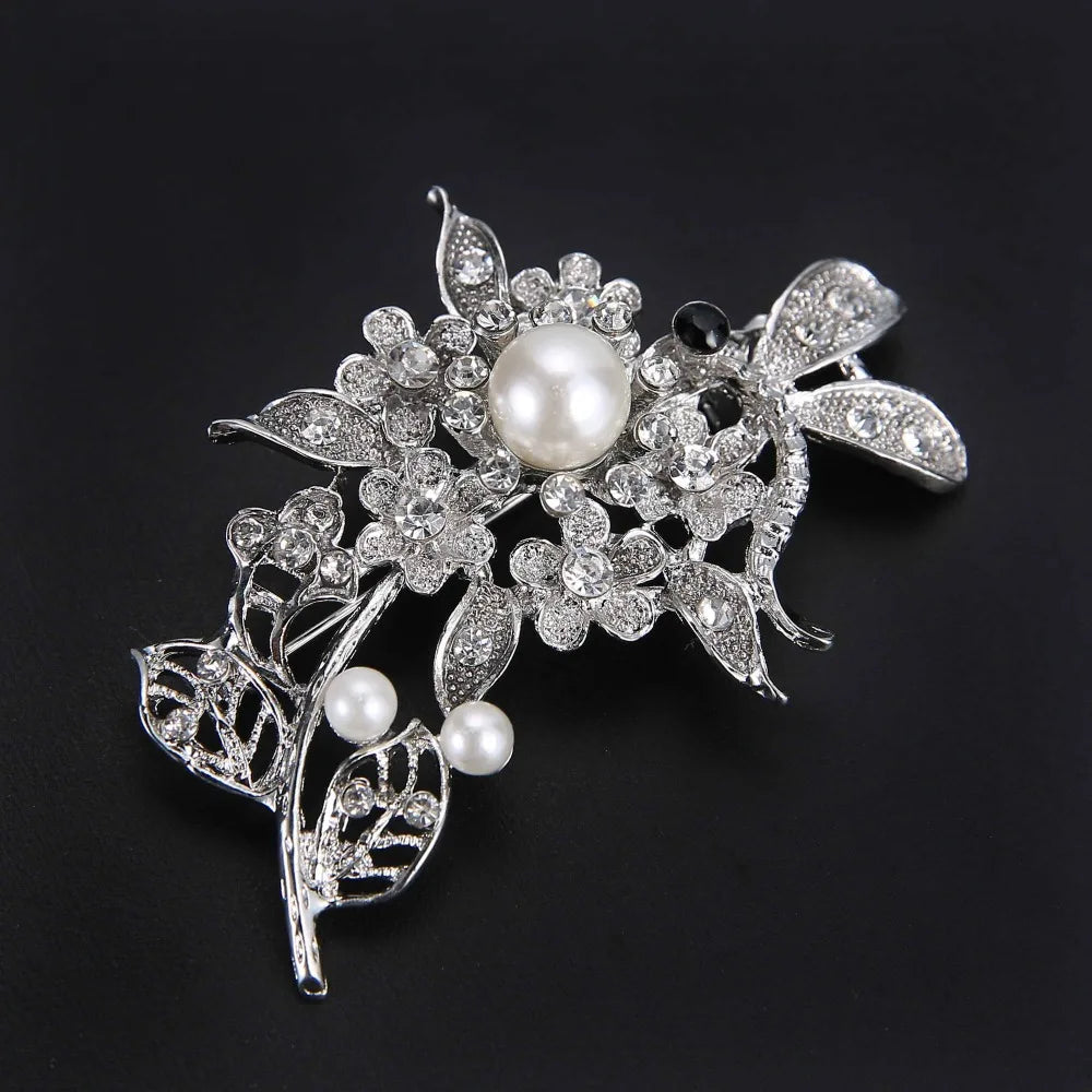 Broche à fleurs en cristal pour femmes, bleu profond, plante, Badge élégant, bijoux à la mode, broche pour fête de mariage, cadeaux de fête