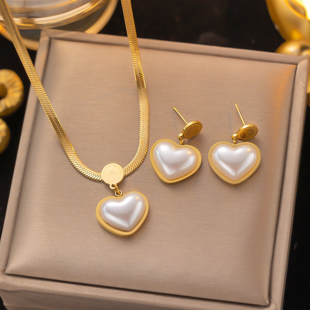 Ensemble de collier et de boucles d'oreilles en acier inoxydable