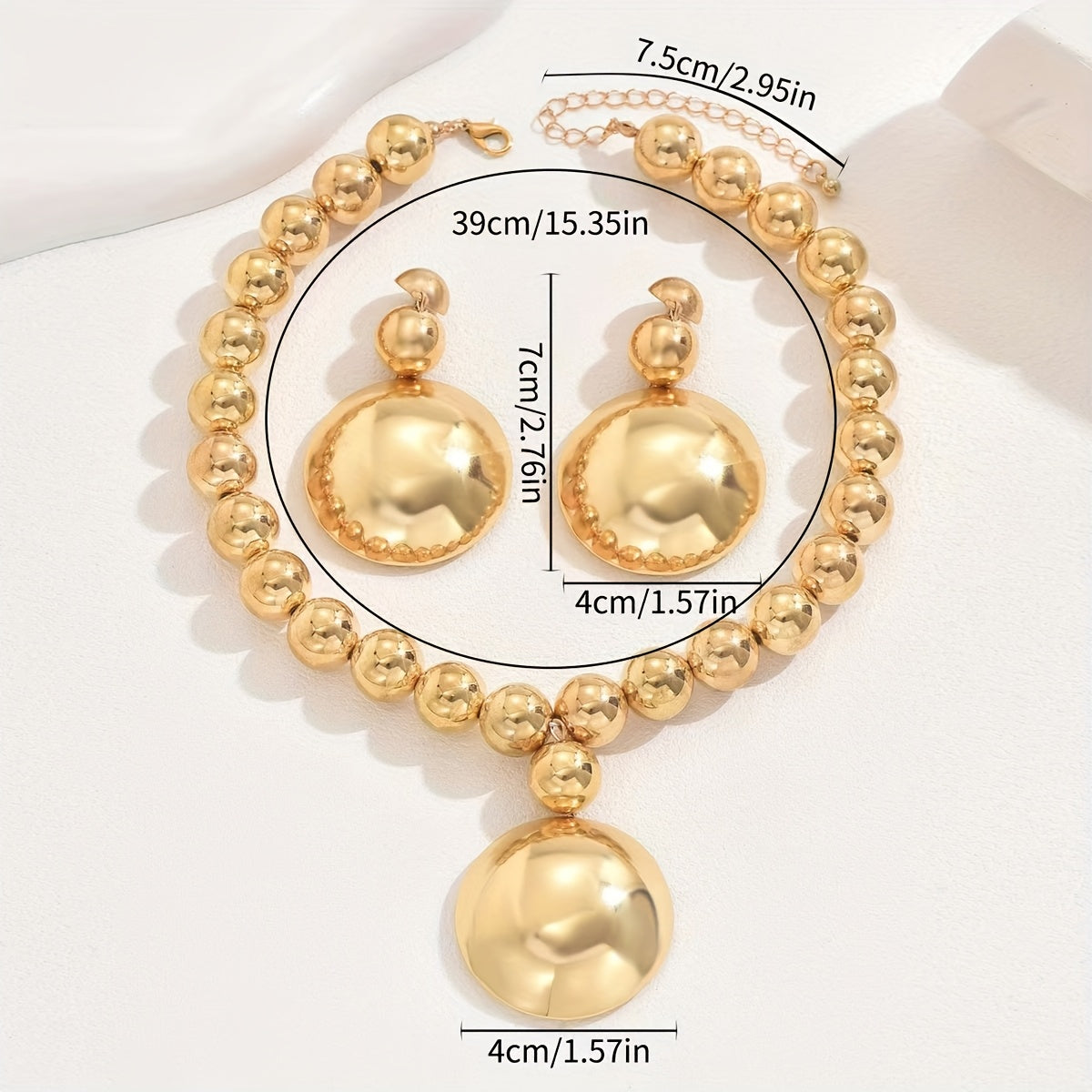Un ensemble de 3 colliers à chaîne à billes texturées en métal.