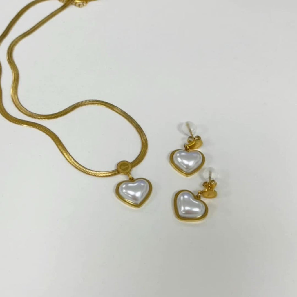Ensemble de collier et de boucles d'oreilles en acier inoxydable