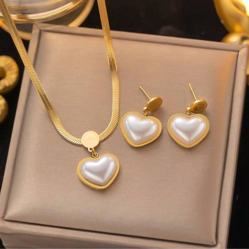 Ensemble de collier et de boucles d'oreilles en acier inoxydable